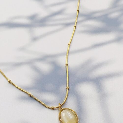 Golden stone neckpiece